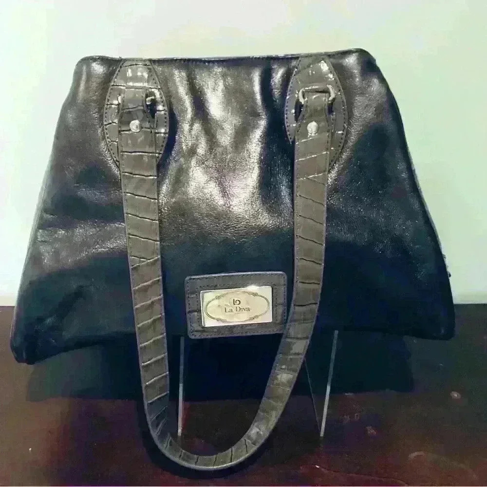 Charcoal Gray  La Diva Handbag. Genuine leather with man made trim.